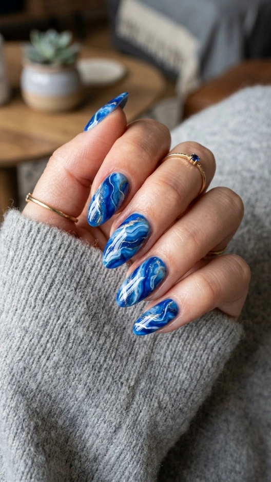 15 Blue Nails Ideas That Are Stunning, Versatile, and Always in Style 15 Blue Marble Nails