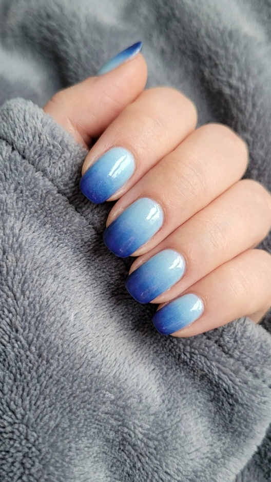 15 Blue Nails Ideas That Are Stunning, Versatile, and Always in Style 9 Ombre Blue Nails